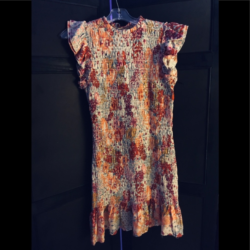 Lovely ruched dress. Springytime colors.